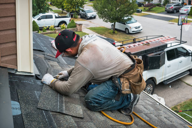Professional Roof Installation technician working in Rives, TN